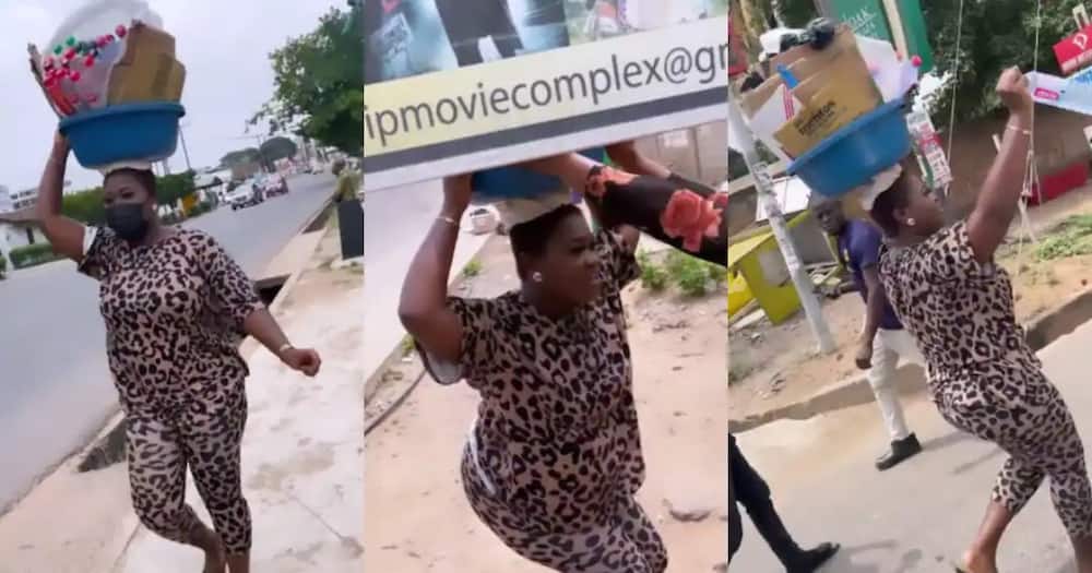 Sista Afia storms streets as water seller.