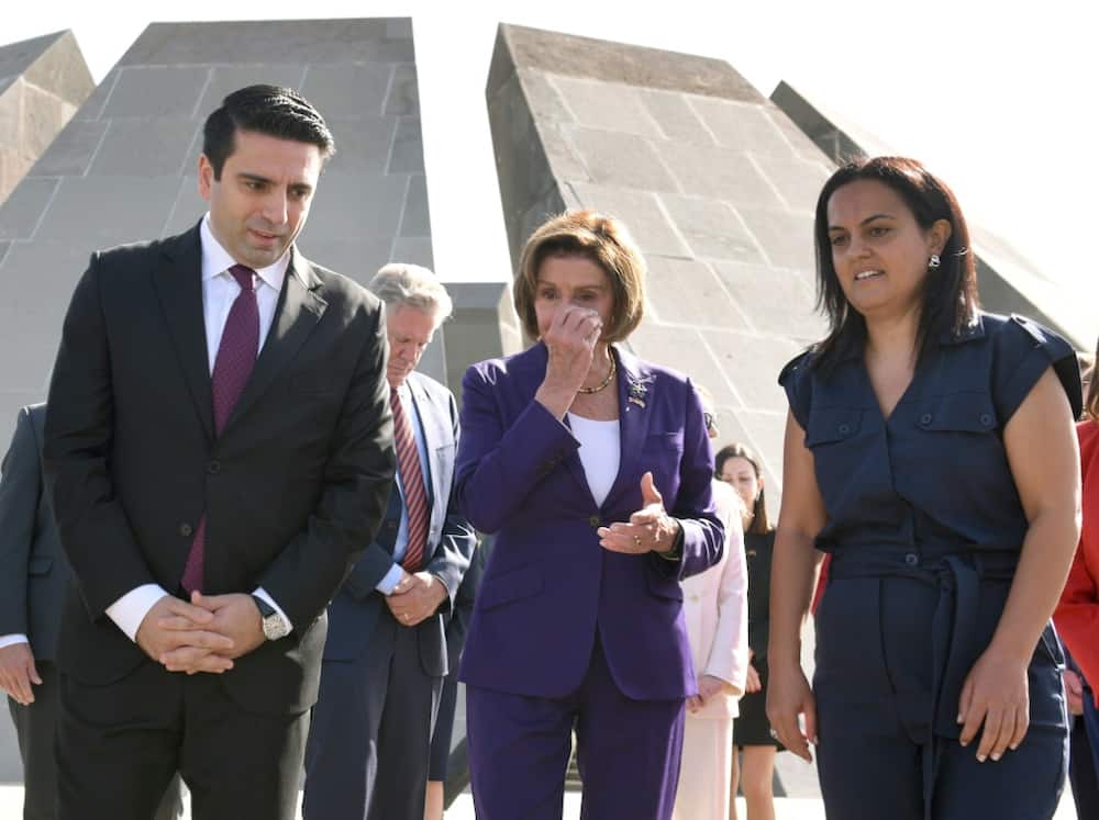 US Speaker of the House Nancy Pelosi (C), flanked by Armenia's Head of the Parliament Alen Simonyan (L), visits the Tsitsernakaberd Armenian Genocide Memorial Complex in Yerevan