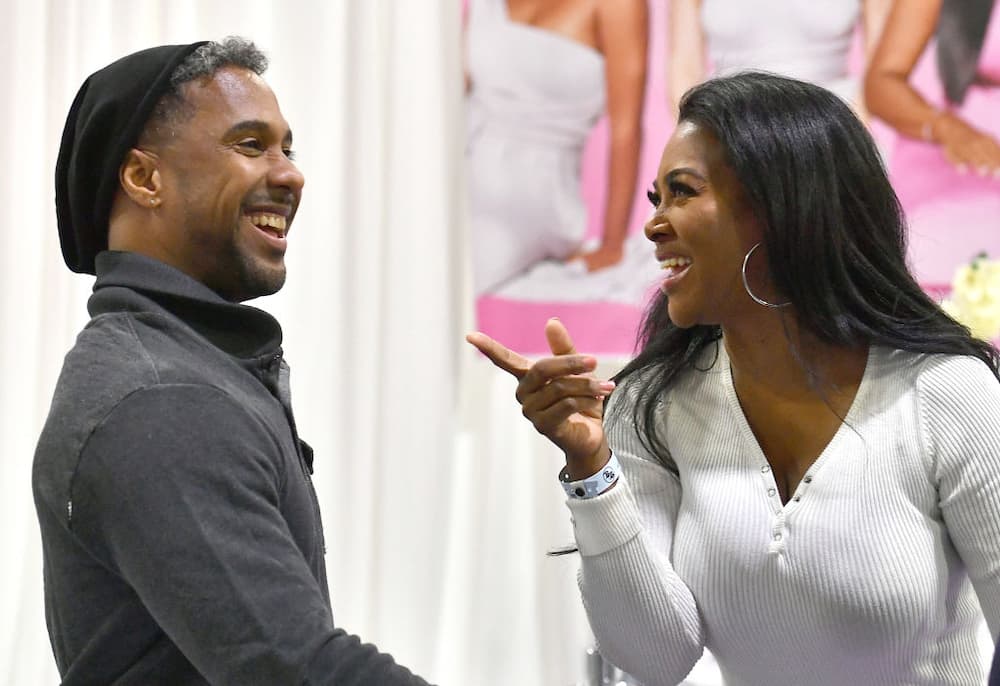 Marc Daly (L) and Kenya Moore at 2020 Bronner Brothers International Beauty Show