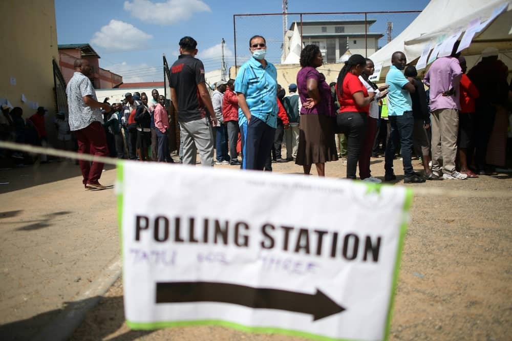 Voters queue at a polling station in Eldoret, the stomping ground of presidential candidate William Ruto