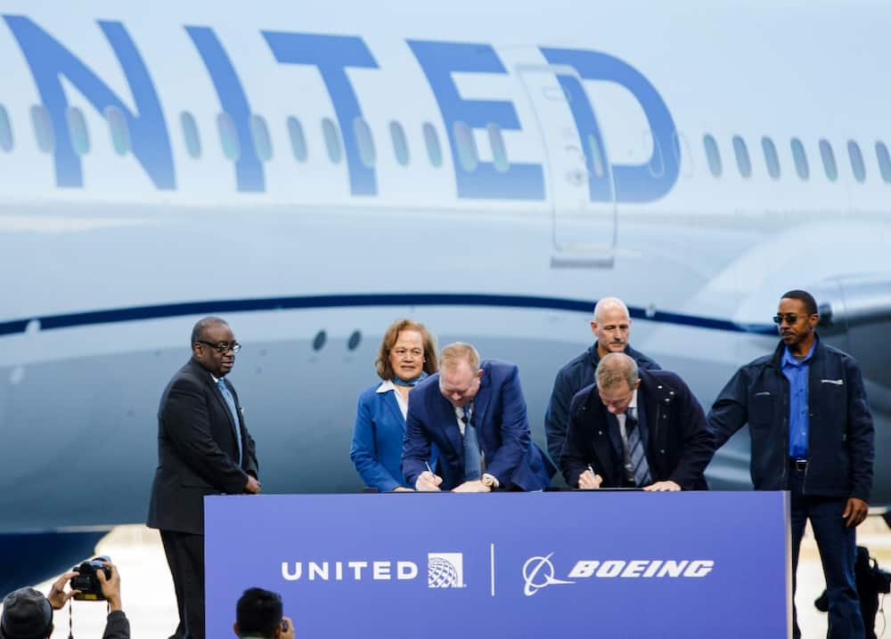 United Airlines CEO Scott Kirby and Stan Deal, head of Boeing's commercial division, signed a giant airplane order in December 2022 in South Carolina
