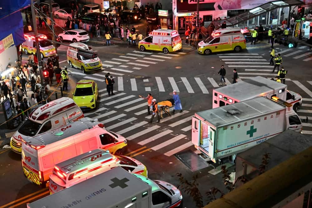 Authorities cordoned off a street where some 120 people were killed in a stampede in South Korea's capital Seoul