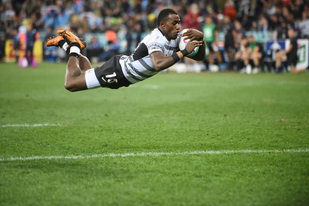 Fiji's Filipe Sauturaga scores during the Rugby World Cup Sevens men's final against New Zealand in Cape Town
