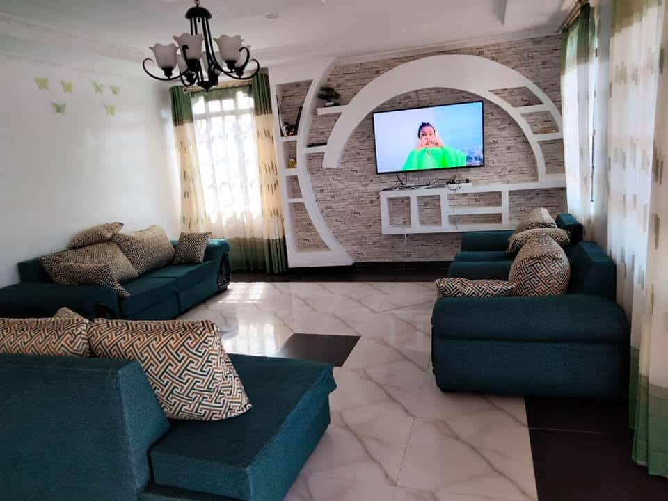 Nairobi dad, 32, who slept hungry as a kid builds palatial home for family