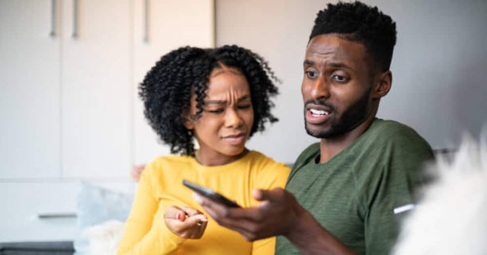 Husband and wife use phone