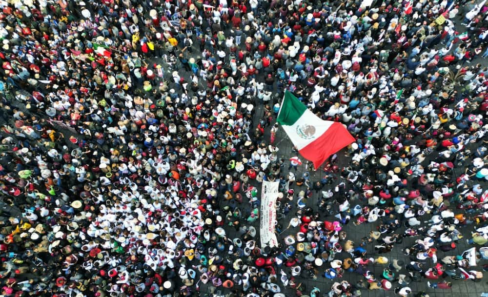 Mexico's president joined flag-waving crowds for a rally that comes as his allies warm up for the race to replace him in 2024