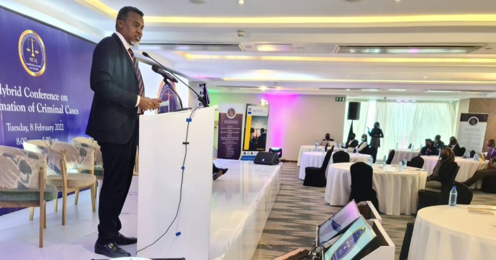 Noordin Haji speaks at a criminal conference.