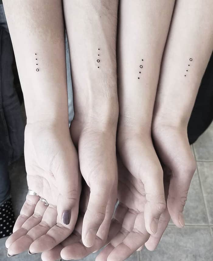 Matching best friend wrist tattoos.