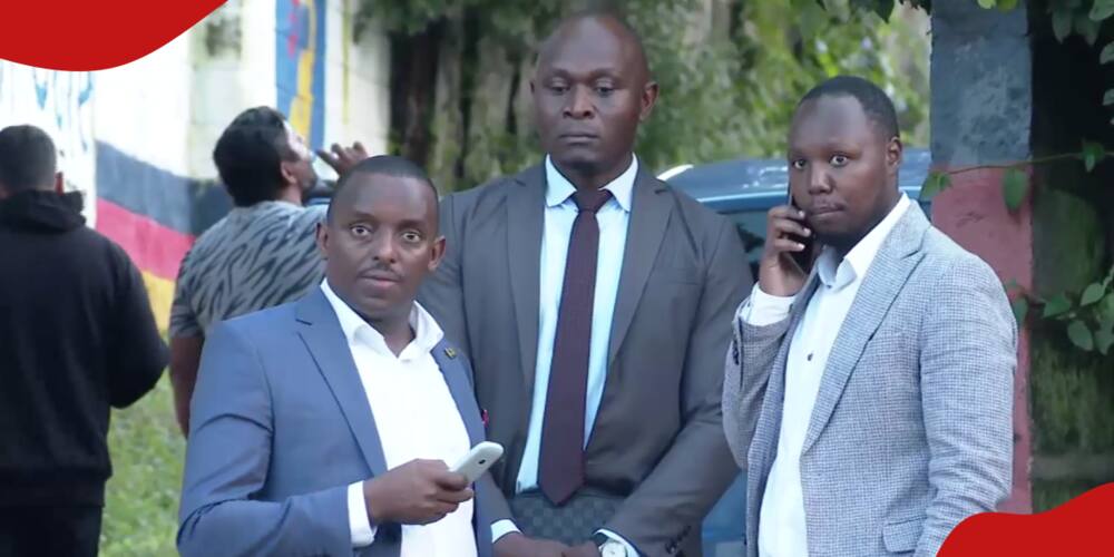Photo of Wanjohi and his lawyers at the DCI offices in Nairobi.