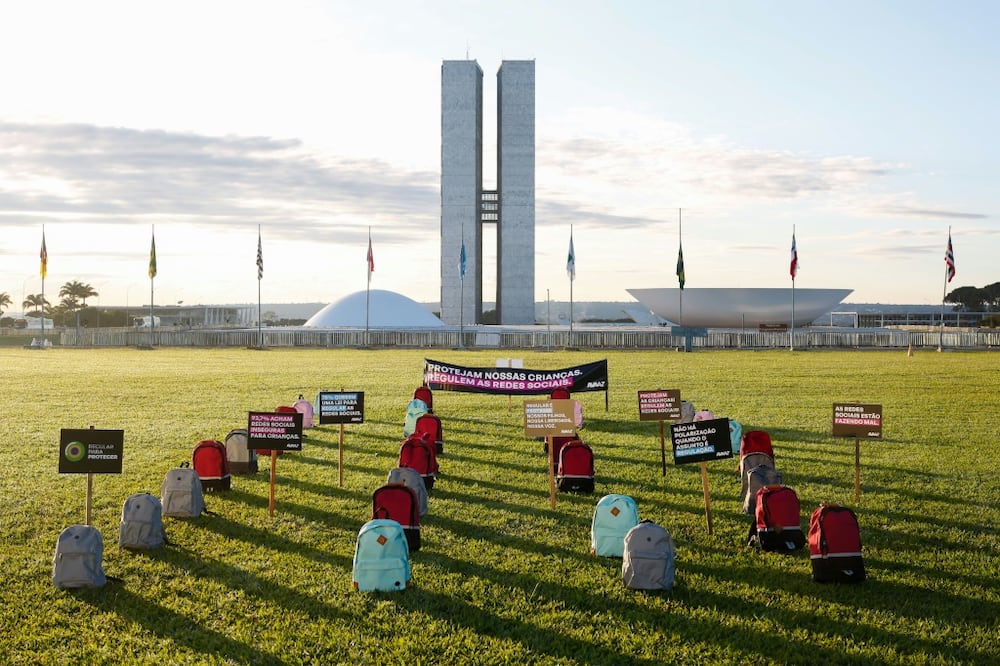 Backpacks representing victims of school massacres, which activists say have increased in Brazil amid lack of regulation of extremism social media, are seen during a protest in front of the National Congress in the capital Brasilia