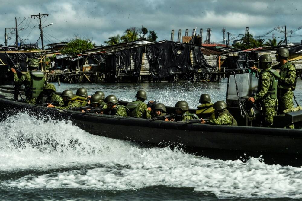 A Colombian navy patrol in the waters around Buenaventura, where rival gangs have turned the major port city into a living nightmare for residents