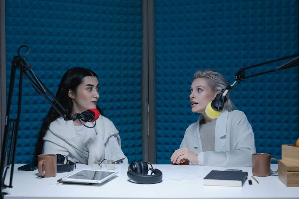 Two women are hosting a podcast