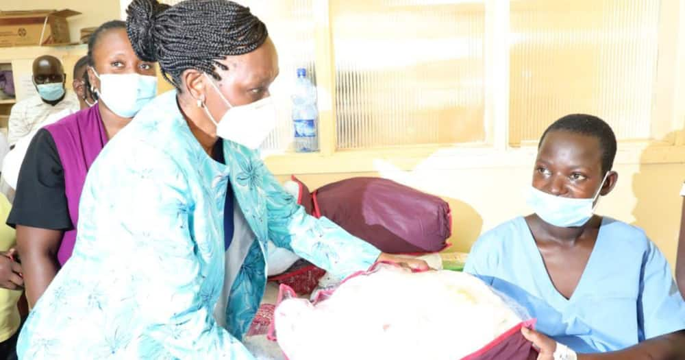 Governor Ongwae's wife Elizabeth gifting Sheila Nyanchera. Photo: Governor James Ongwae.