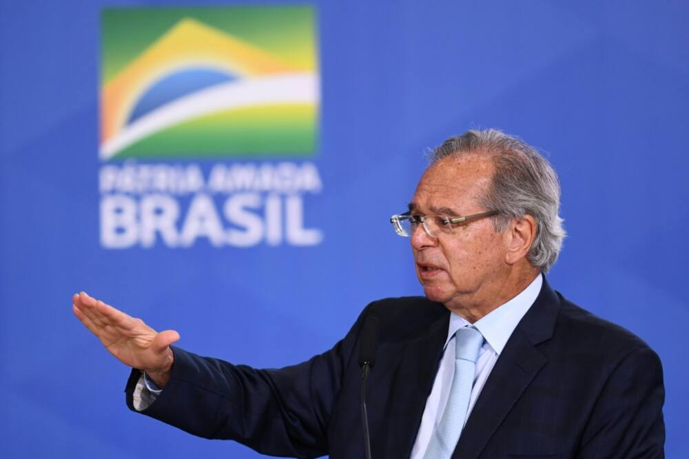 Brazilian Minister of Economy Paulo Guedes -- seen here in June 2022 -- has reopened old wounds with France over Amazonian forest fires by using some decidedly undiplomatic language in a recent speech