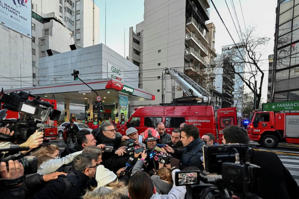 The fire broke out on the seventh floor of a 14-story apartment building in Buenos Aires, and quickly spread to the eighth