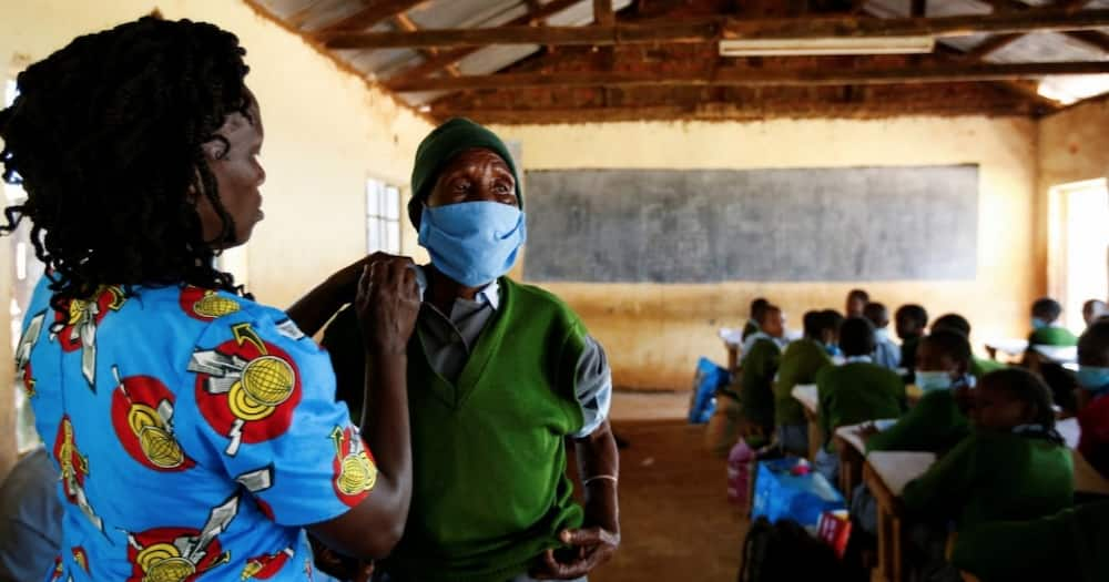 Priscilla Sitienei and her teacher.