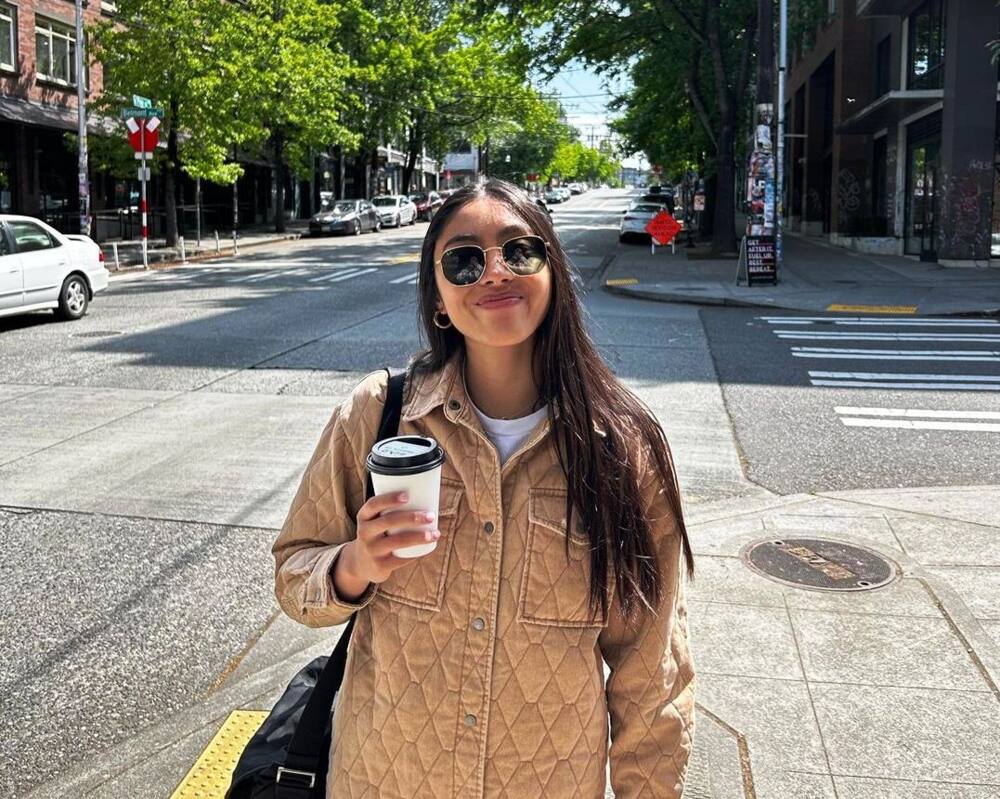 Kayla Padilla poses for a photo on the streets of Seattle, Washington.