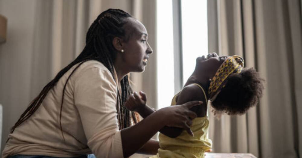 Mum calming her daughter. Photo for illustration.