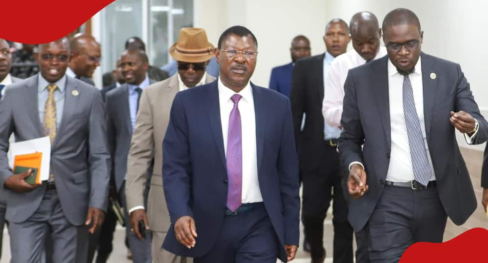 National Assembly Speaker Moses Wetang'ula and Nairobi governor Johnson Sakaja walk side by side.