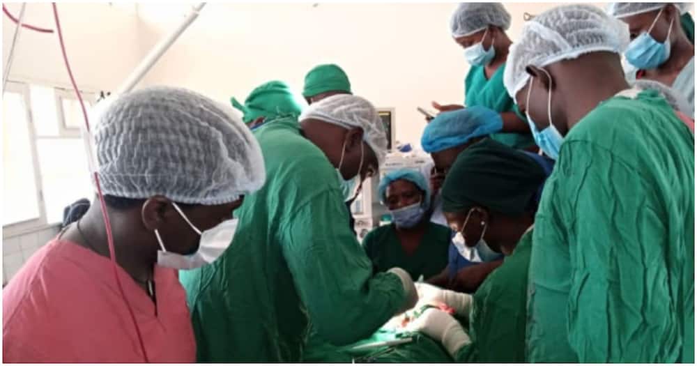 Doctors SuccSurgeons at Soroti Regional Referral Hospital conduct an operation on conjoined twins. Photo: Daily Monitor.