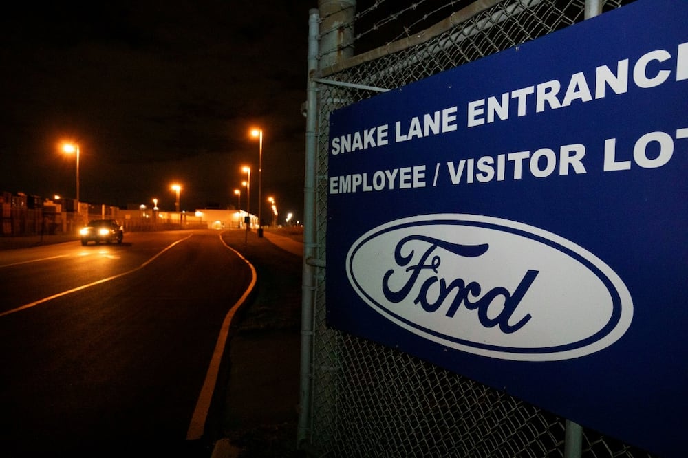 A preliminary deal between Ford and the Canadian auto workers union has averted a strike as a US stoppage enters its sixth day