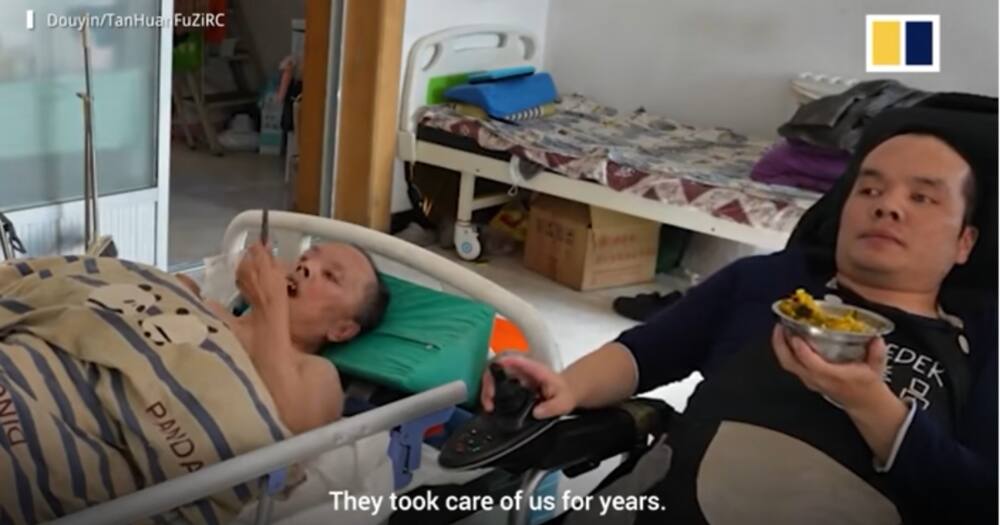 Disabled son diligently looks after his father who suffered a stroke.