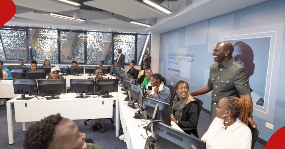 President William Ruto interacting with youths during the launch of a call centre in Kiambu.