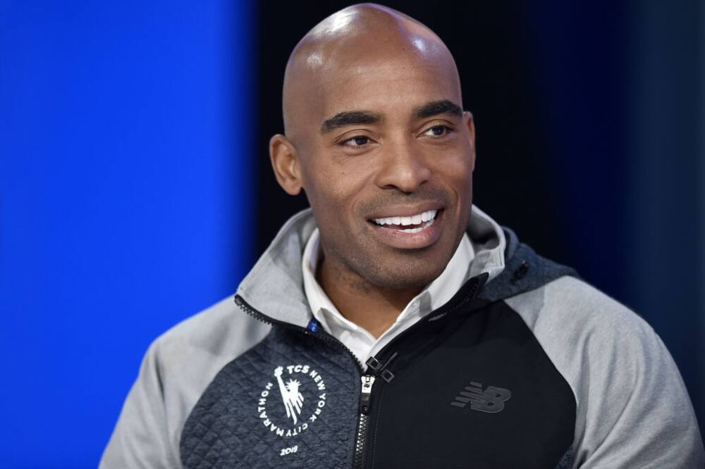 Athlete Tiki Barber and his wife Ginny attend the premiere of A