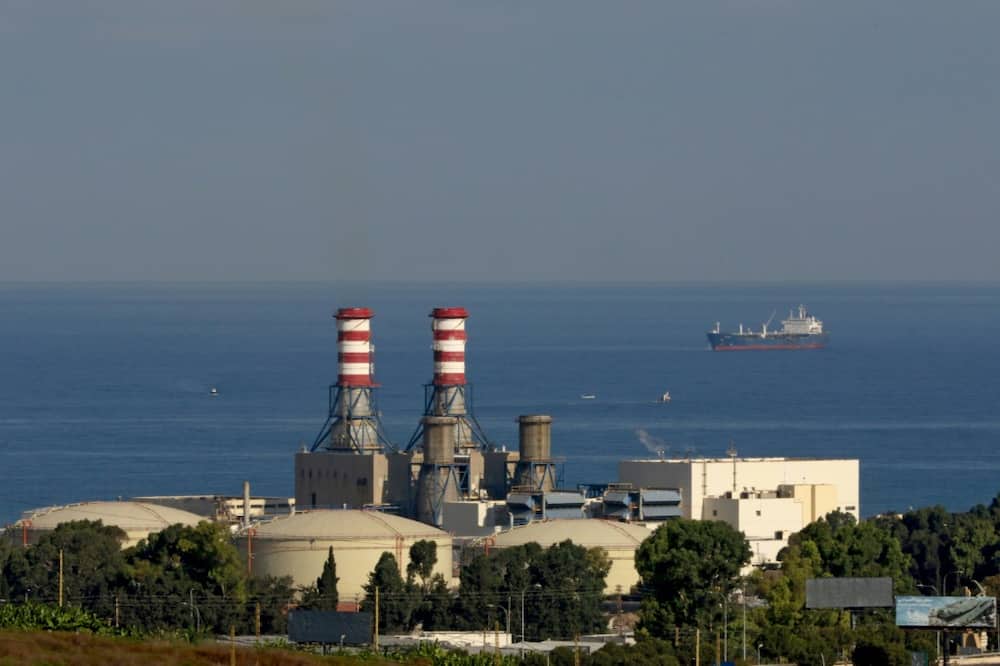 A tanker carrying fuel oil from Iraq is anchored off the Zahrani power plant near the southern Lebanese city of Sidon (Saida) on September 18, 2021
