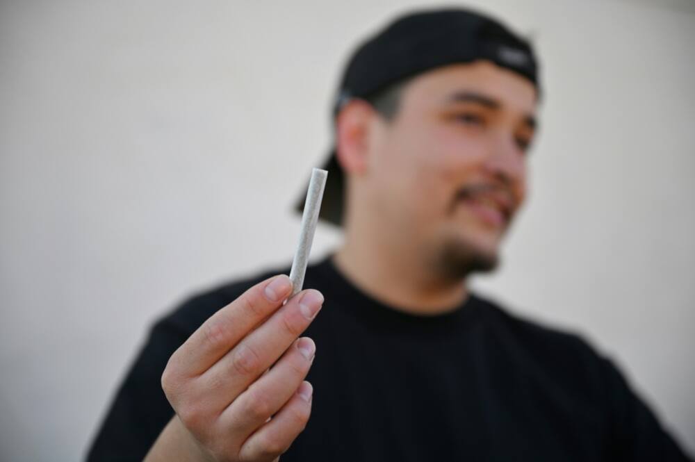 Omar Buddakey estimates he saves the identical of a paycheck yearly by seeking to secure his weed on the murky market Omar Buddakey estimates he saves the identical of a paycheck yearly by seeking to secure his weed on the murky market