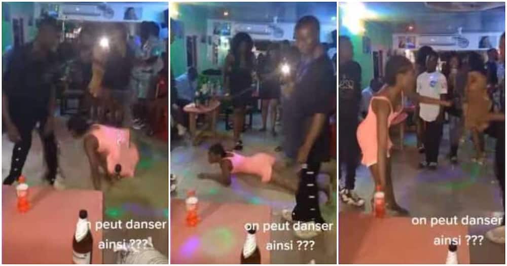Social media reacts to video of a lady dancing on her belly like a snake at club, video stirs reactions.