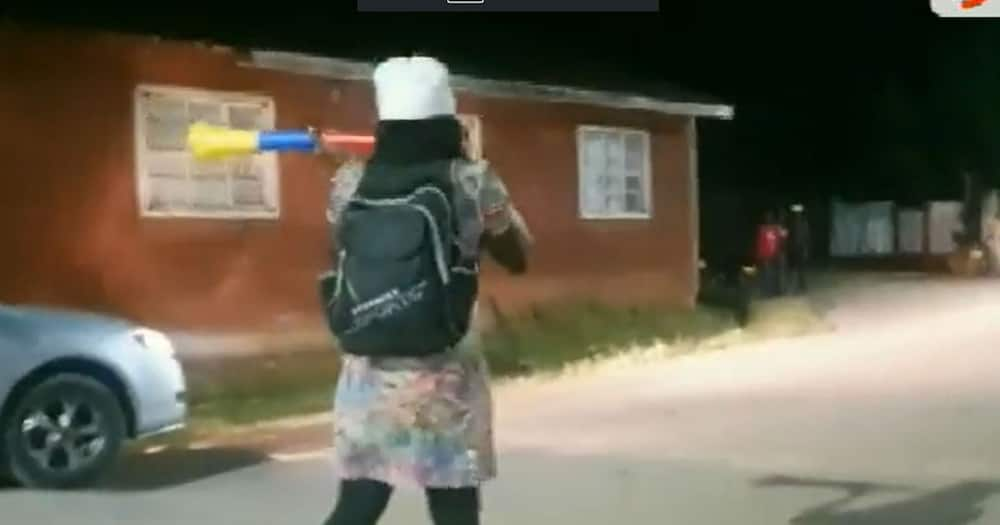 Kakamega woman with vuvuzela.