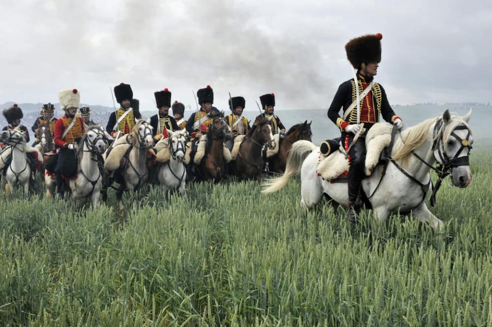 People dressed up as soldiers stage a re-enactment in 2010 of the 1815 Battle of Waterloo in Waterloo