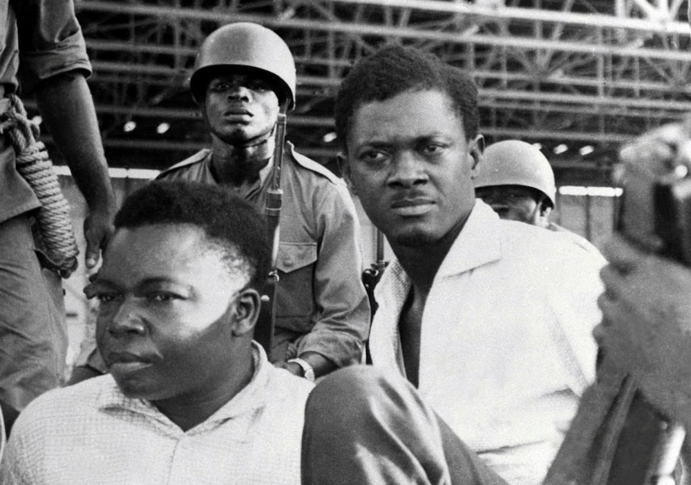 One of the last pictures of Lumumba, right. He and Joseph Okito, left, the vice president of the Senate, were arrested in Leopoldville, now Kinshasa, in December 1960. They were killed the following month