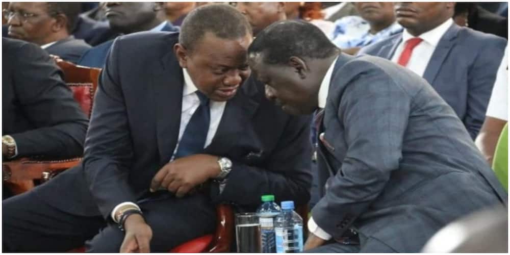 President Kenyatta and Raila Odinga conversing in a past event. Photo: Mwakilishi