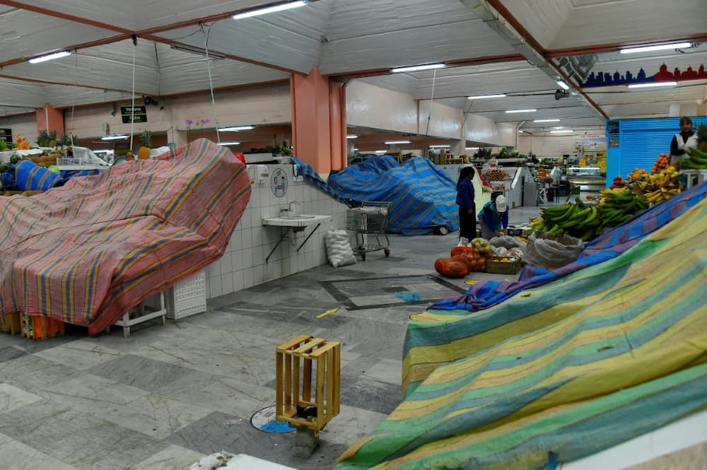 Ecuador markets now house empty trays, tarp-covered display cases and deserted stalls, with two weeks of nationwide protests being felt far and wide
