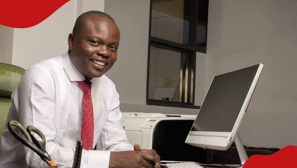 Lawyer Peter Wanyam poses for a photo in his office