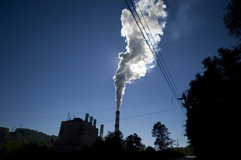 A plume of exhaust extends from the Mitchell Power Station, a coal-fired power plant located 20 miles southwest of Pittsburgh, in 2013