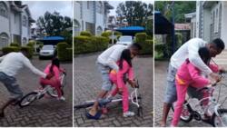DJ Mo Lovingly Teaches Daughter Wambo to Ride Bike, Shields Her from Falling: "You're Learning"