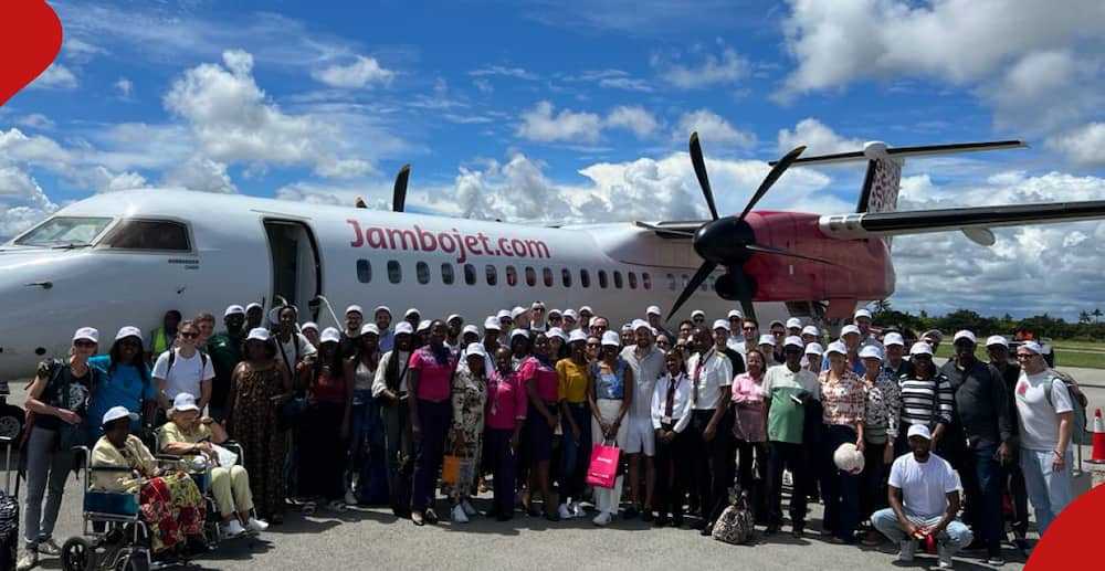 A Jambojet plane and passengers.