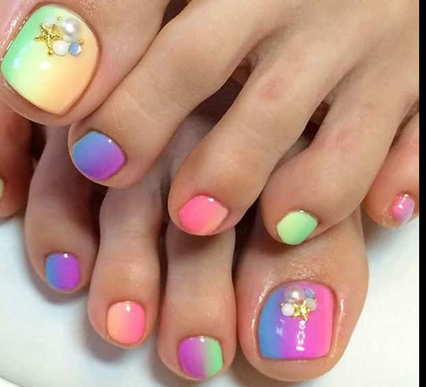 Ombre rainbow toe nail design