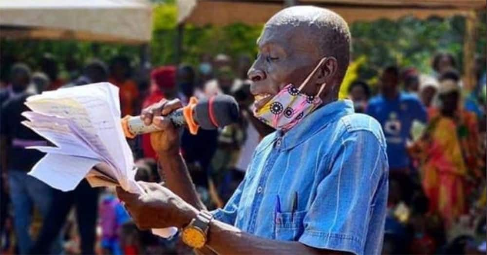 Godfrey Jjemba Matte reads funeral announcements.