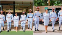 Lucy Natasha Slays in White Lace Dress, Steps Out with Her Security Team Donning Matching Military Uniform