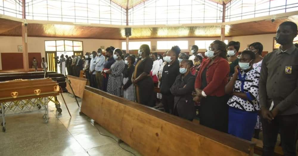 James Gakara's relatives during a memorial service. Photo: Nation.