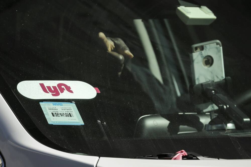 A fresh round of layoffs announced at Lyft is intended to make the company "flatter" and save money to be used to keep drivers happy and fares competitive at the rideshare company that competes with Uber in North America