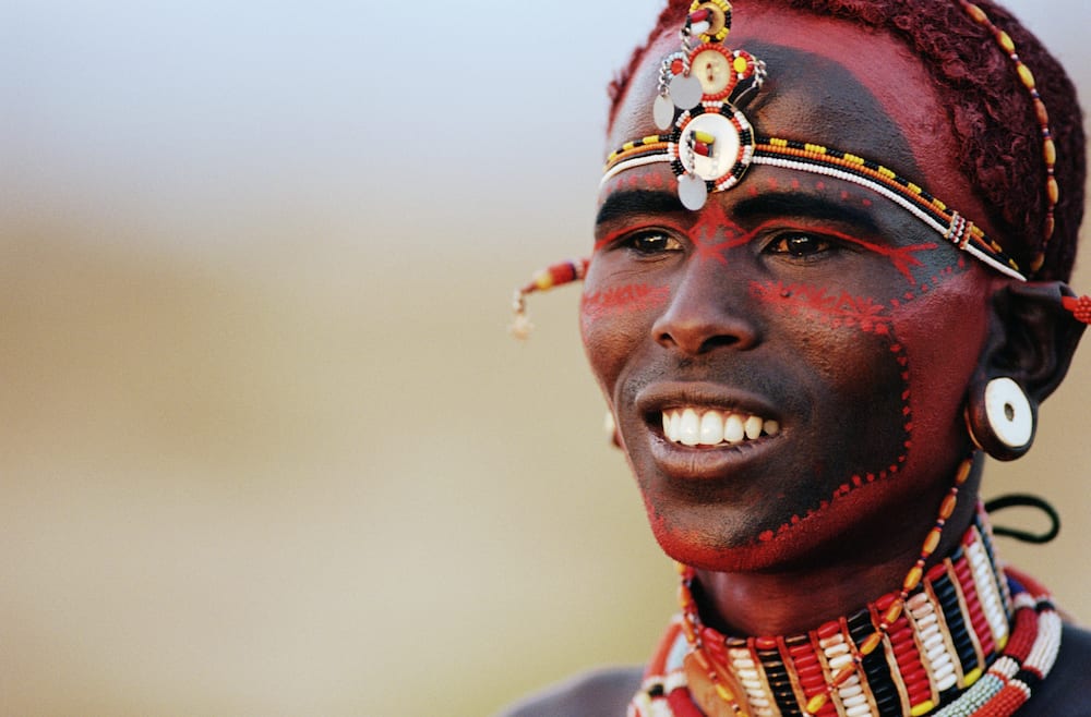 african tribal man painting