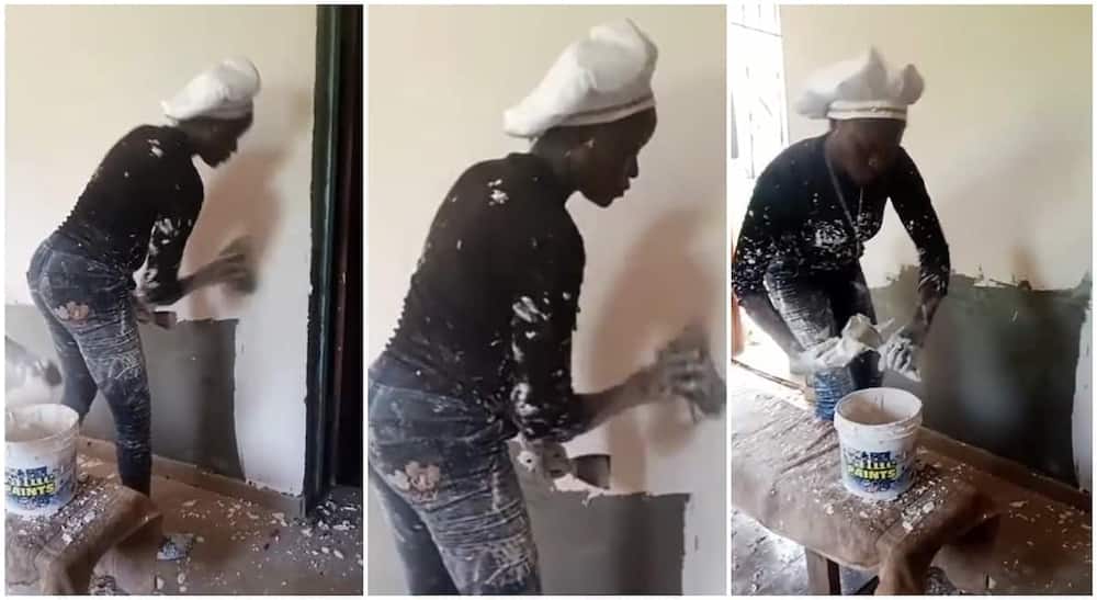 Photos of a Nigerian lady who works as a painter.