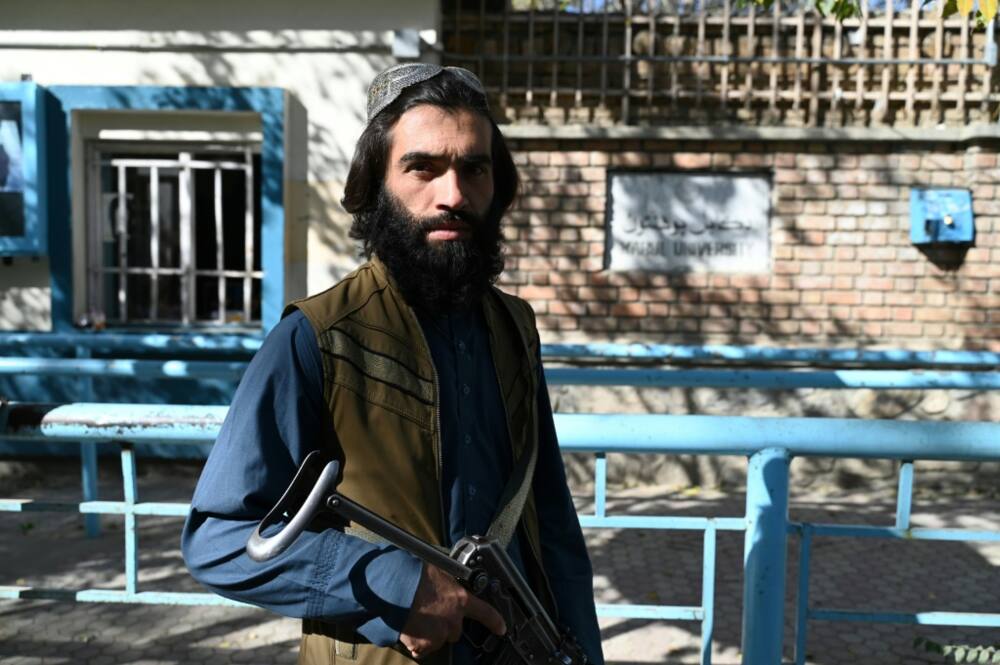 Taliban forces patrolled the surrounding area and shut nearby streets with roadblocks