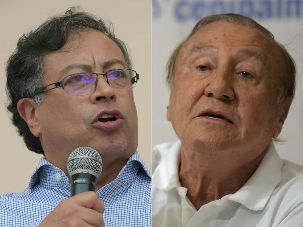 This combination photo shows Colombian leftist presidential candidate Gustavo Petro (L) and his rival, the independent businessman Rodolfo Hernandez