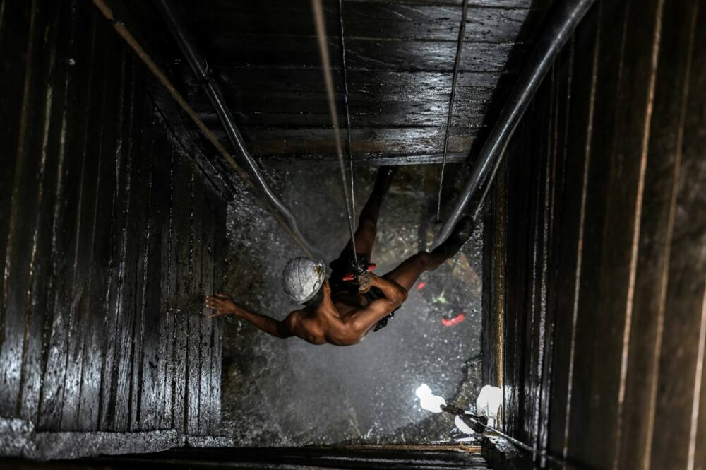A miner works at an illegal copper mine in Canaa dos Carajas, Brazil, in April